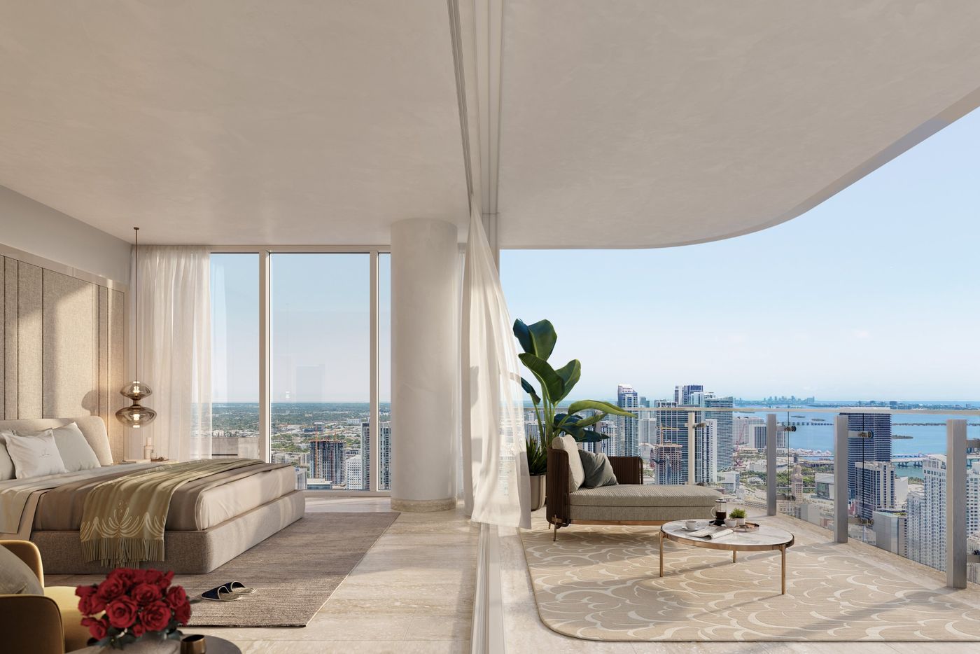 Primary bedroom opening to a curved terrace above Downtown Miami