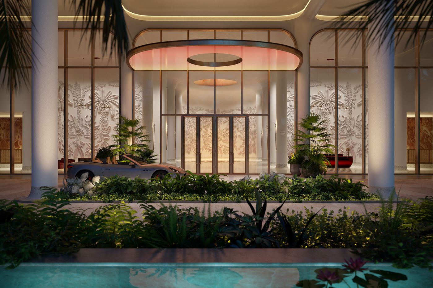 Arched glass doors and plaster relief walls at night