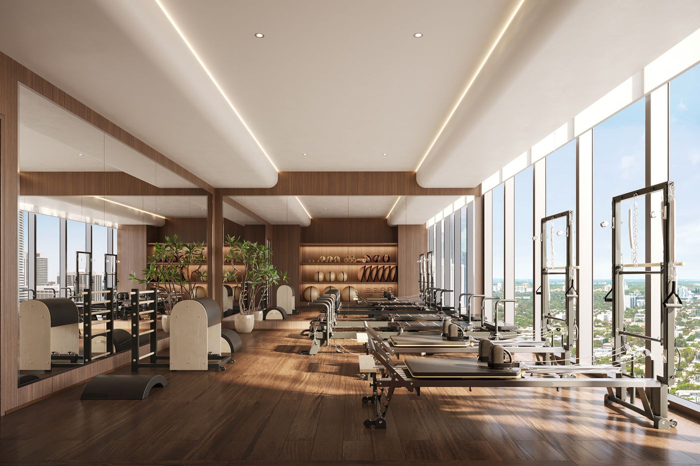 Reformer studio with walnut walls and city views